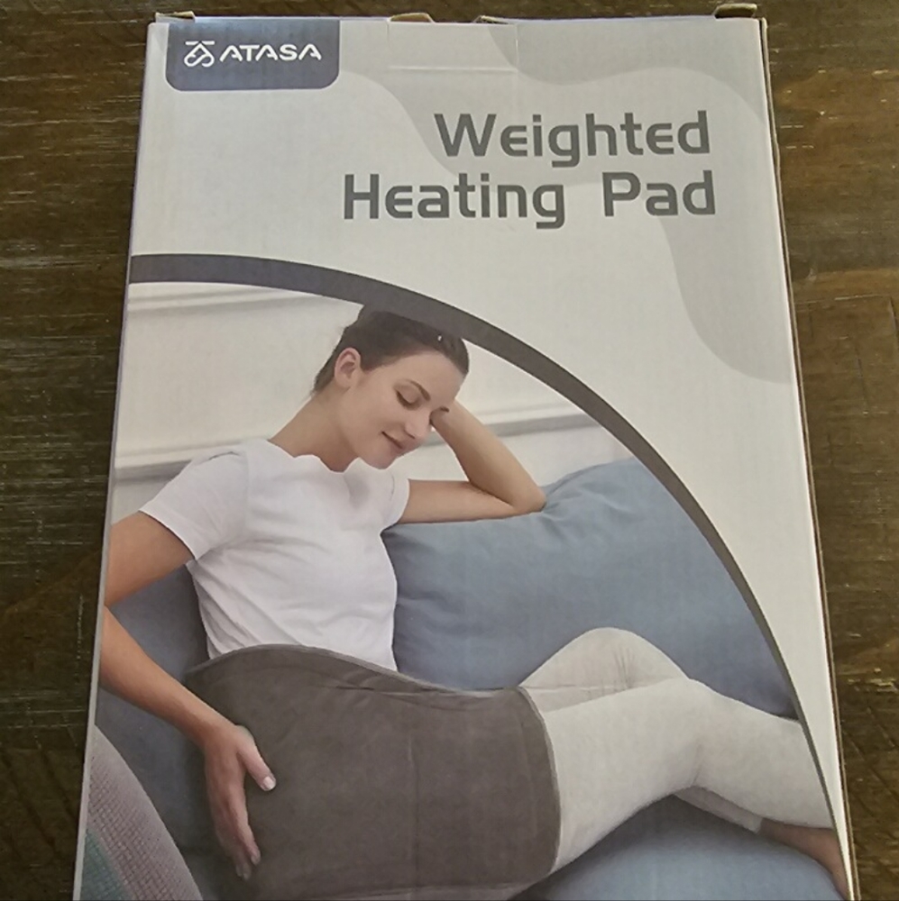 Weighted heating pad